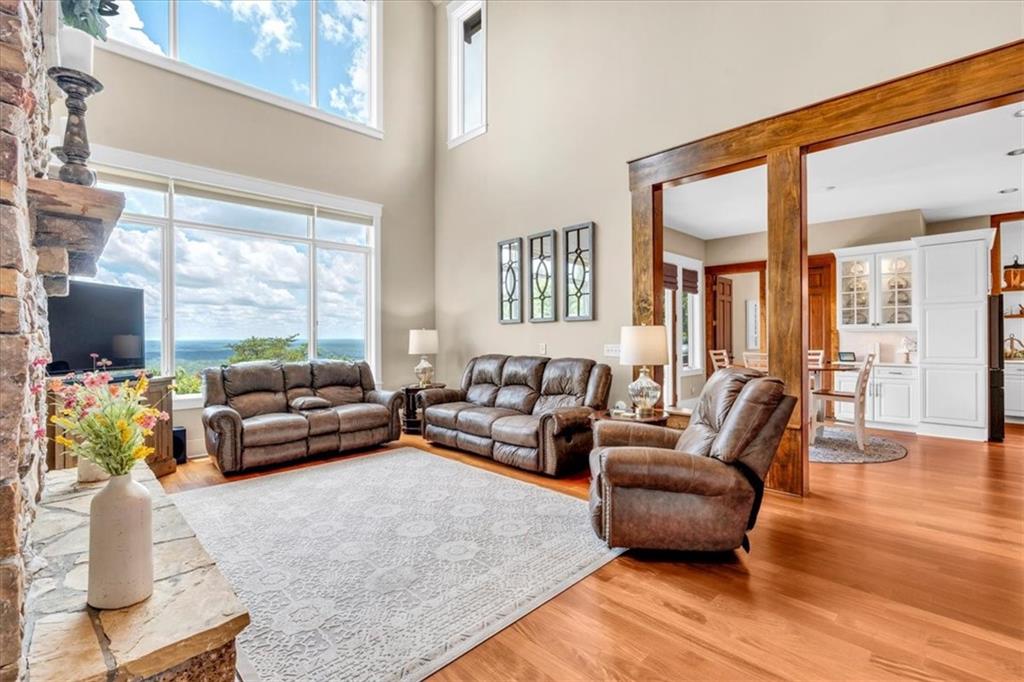 52 Waterside Drive Southeast Cartersville, GA 30121 - Photo 19 of 110 a living room with furniture and a flat screen tv