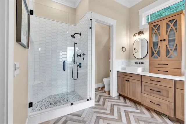 a living room with furniture a couch and a large window