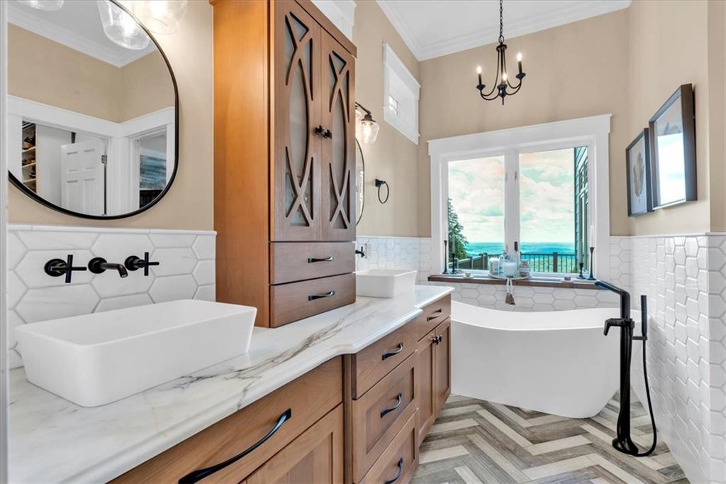 52 Waterside Drive Southeast Cartersville, GA 30121 - Photo 26 of 110 a bathroom with a double vanity sink mirror and bathtub