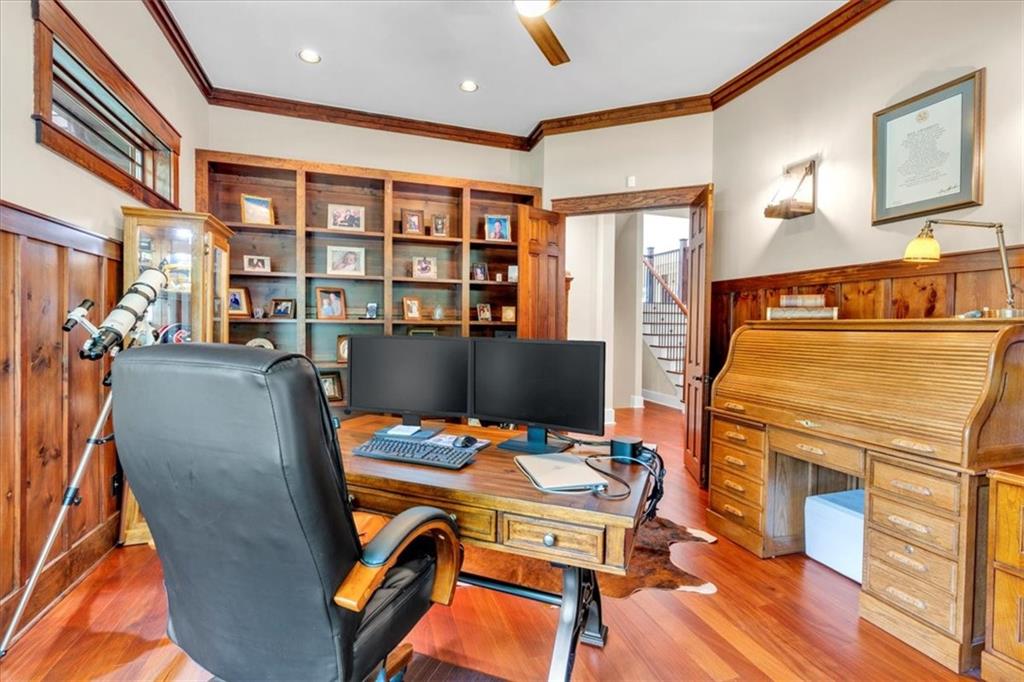 52 Waterside Drive Southeast Cartersville, GA 30121 - Photo 31 of 110 a dining room with furniture a rug a fireplace and wooden floor