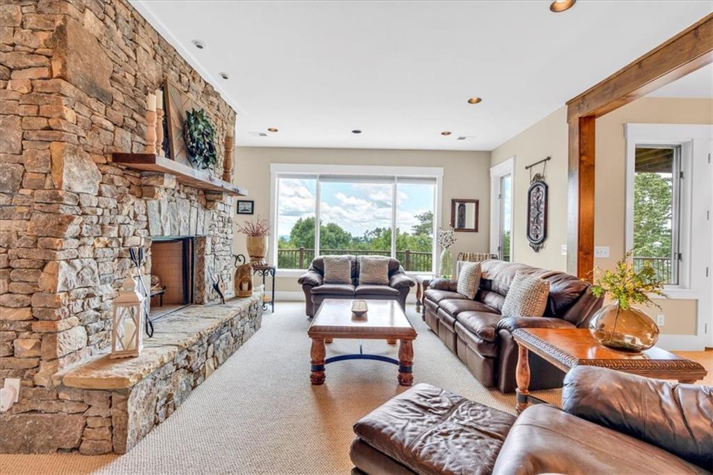 52 Waterside Drive Southeast Cartersville, GA 30121 - Photo 49 of 110 a living room with furniture and a fireplace