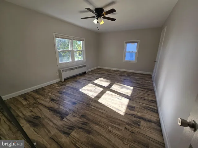 a view of an empty room and window