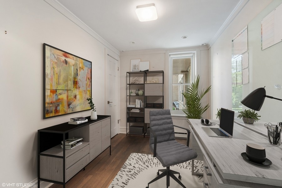 1544 North State Parkway, Unit 3A Chicago, IL 60610 - Photo 17 of 23 a living room with furniture and a flat screen tv