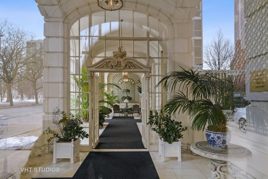 1544 North State Parkway, Unit 3A Chicago, IL 60610 - Photo 3 of 23 a view of a building with a potted plant