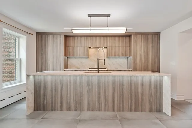 a view of kitchen with furniture and window