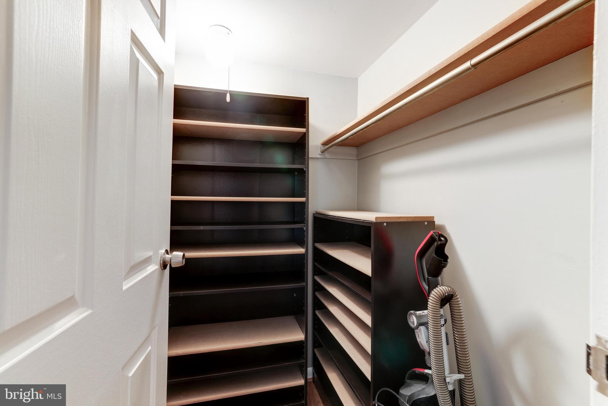 11244 Chestnut Grove Square, Unit 255 Reston, VA 20190 - Photo 26 of 37 Hall storage closet