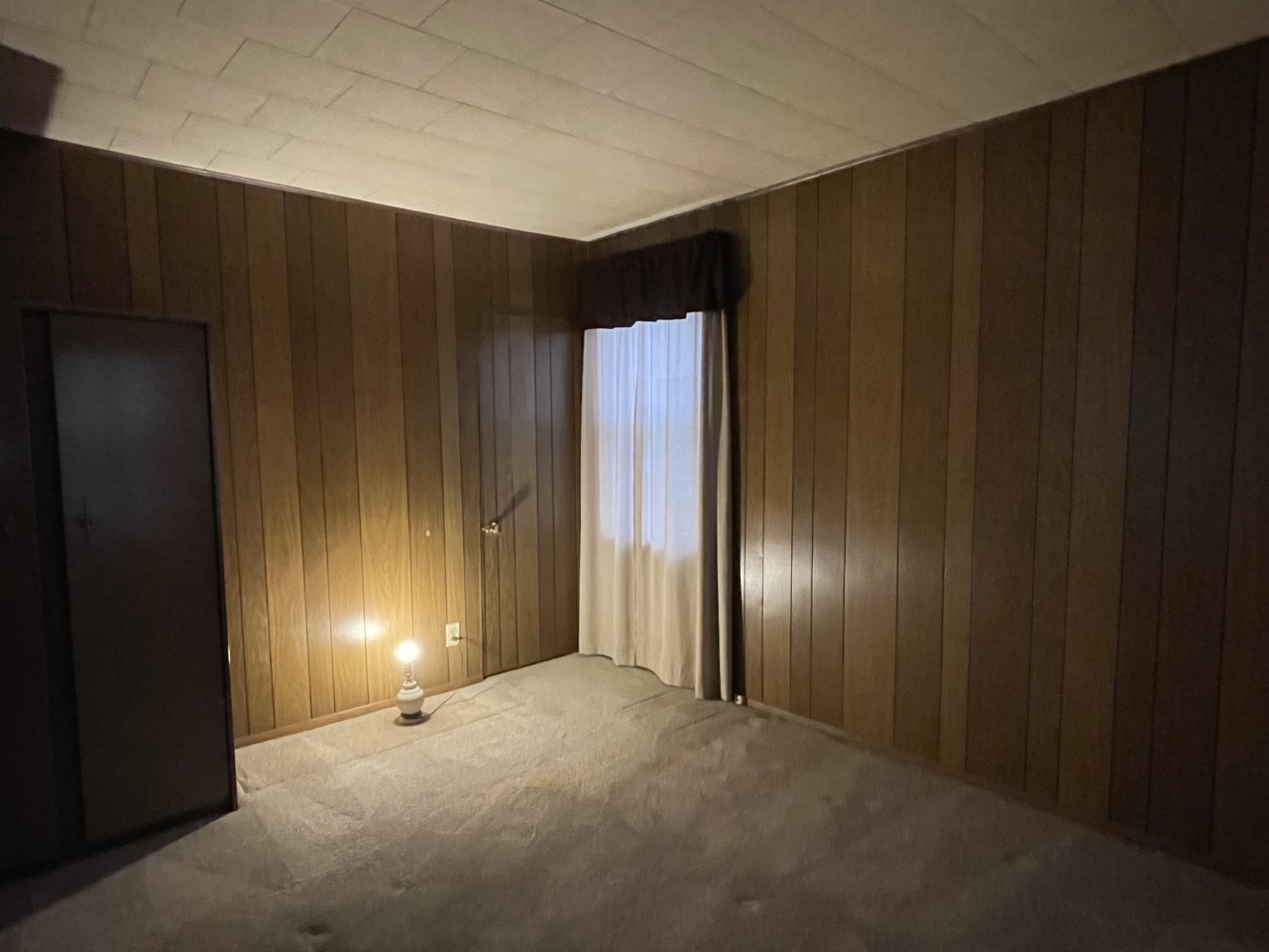 210 South Main Street Herscher, IL 60941 - Photo 9 of 23 a view of empty room with wooden walls