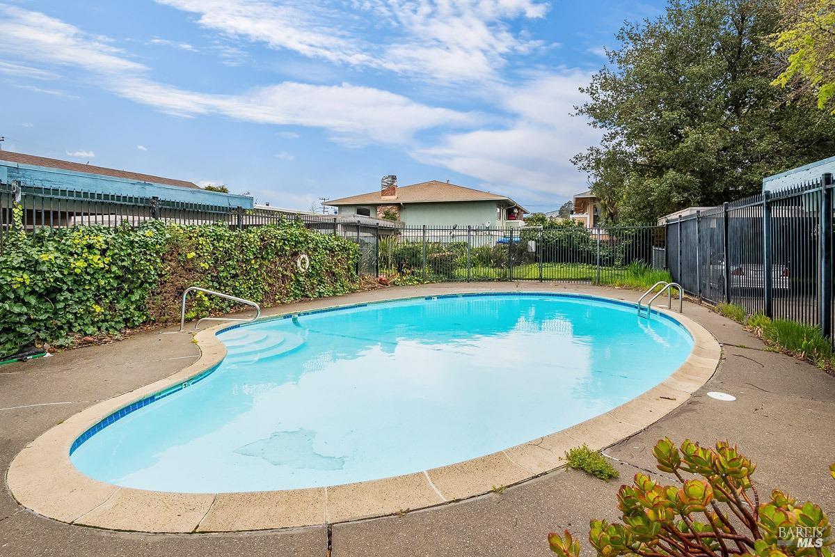 22 Fairfax Street, Unit B San Rafael, CA 94901 - Photo 7 of 8 a view of swimming pool with outdoor seating and plants