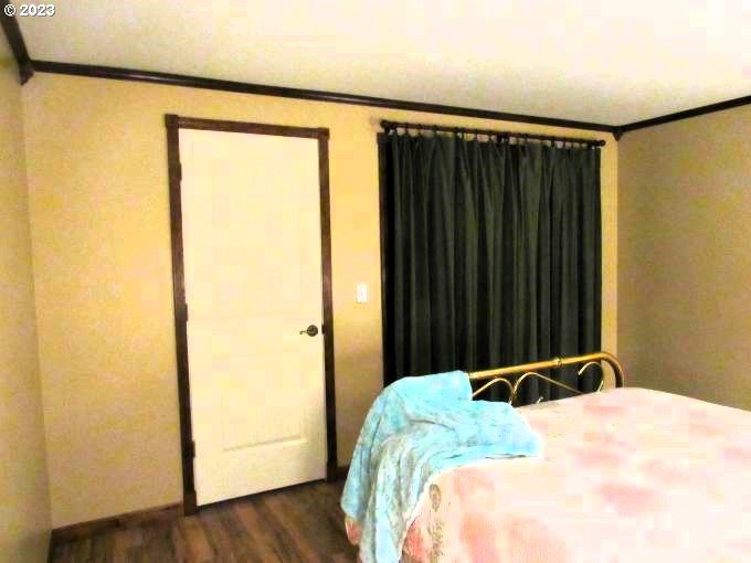 150 Southeast Palmblad Drive Gresham, OR 97080 - Photo 20 of 36 a bed sitting in a bedroom next to a window