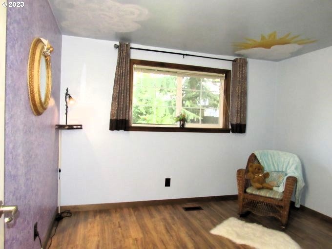 150 Southeast Palmblad Drive Gresham, OR 97080 - Photo 25 of 36 a room with a window and wooden floor