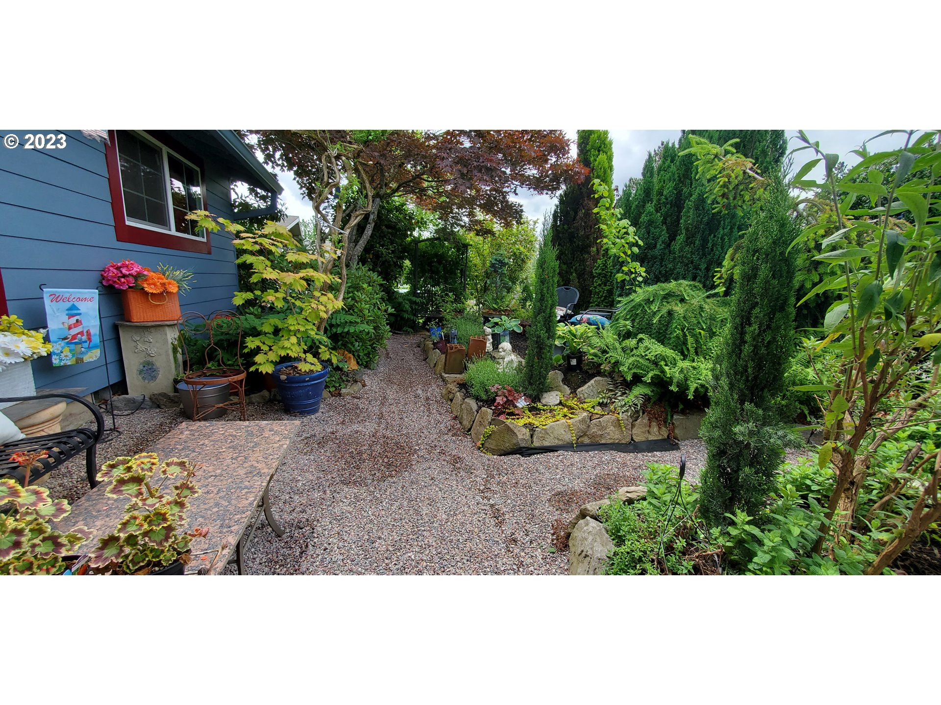 150 Southeast Palmblad Drive Gresham, OR 97080 - Photo 7 of 36 a view of a garden