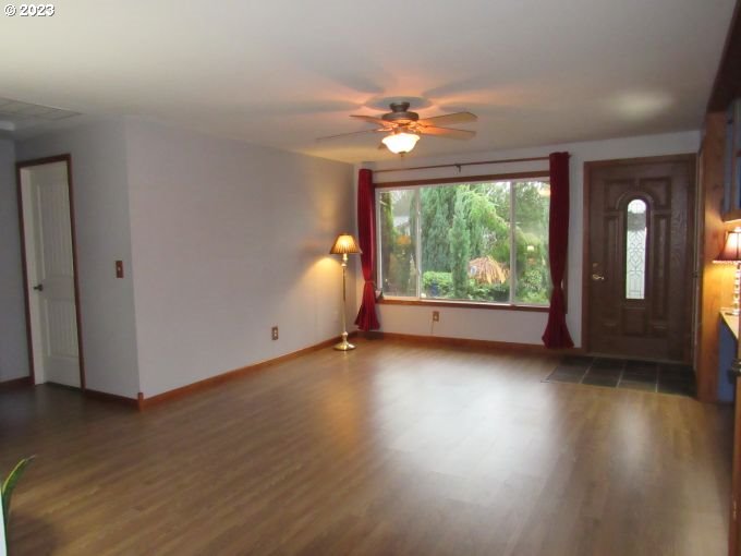 150 Southeast Palmblad Drive Gresham, OR 97080 - Photo 10 of 36 a view of a room with wooden floor fan and window