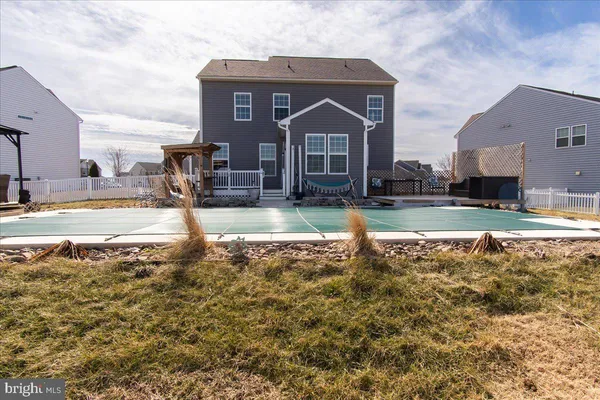 a view of residential houses with outdoor space