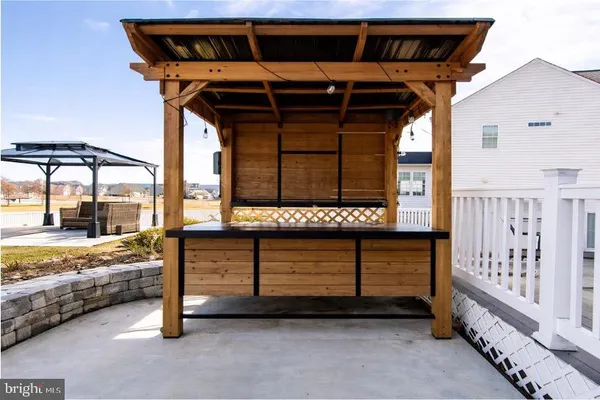 an aerial view of a house with a swimming pool