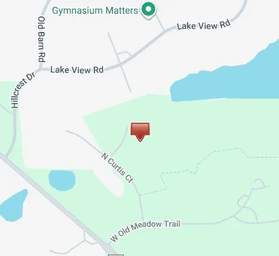 a lake view with a big yard