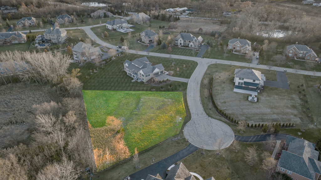 23697 North Matthew Court Long Grove, IL 60047 - Photo 2 of 17 an aerial view of a house with outdoor space