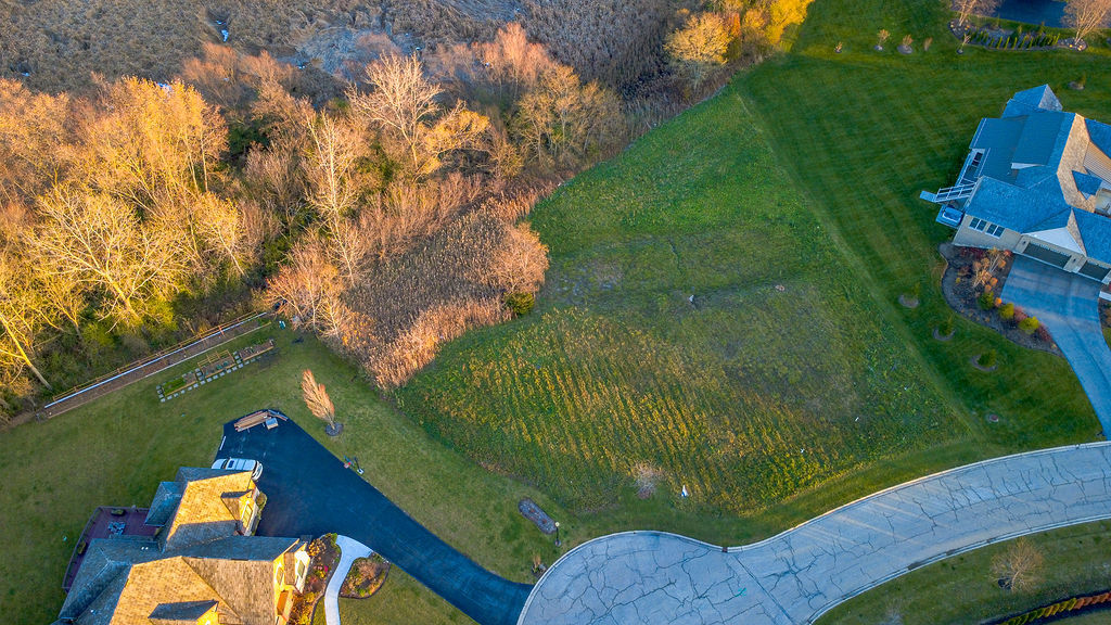 23697 North Matthew Court Long Grove, IL 60047 - Photo 5 of 17 a view of a lake from a balcony