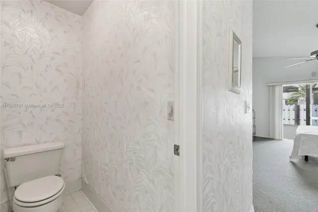 a view of a bathroom from the hallway