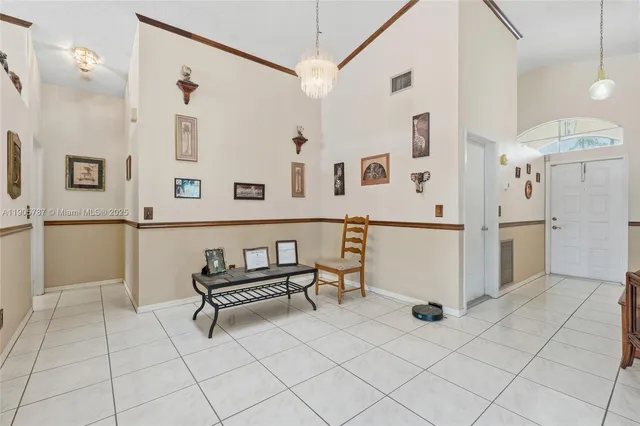 a kitchen with stainless steel appliances granite countertop a sink stove and microwave