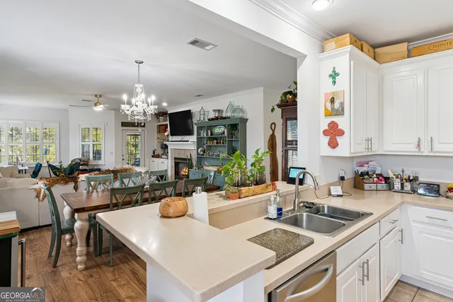 a view of a kitchen and dining room