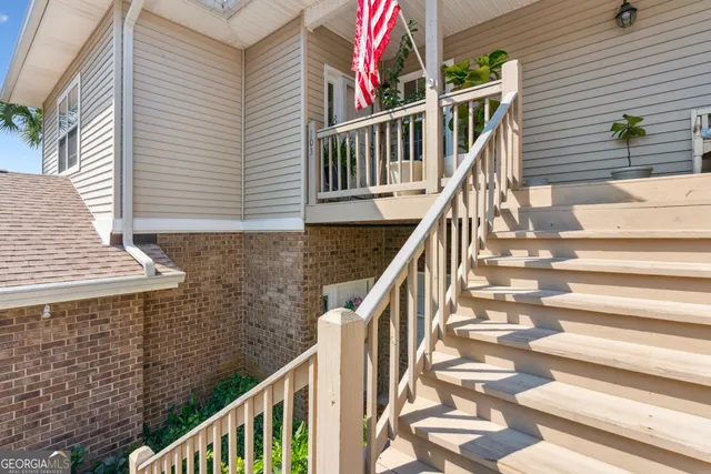a view of entryway with wooden floor