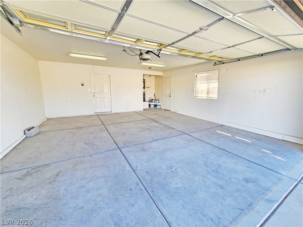 4591 Stoneham Street Pahrump, NV 89061 - Photo 39 of 42 Secure parking and ample storage space are offered in this well-lit garage.