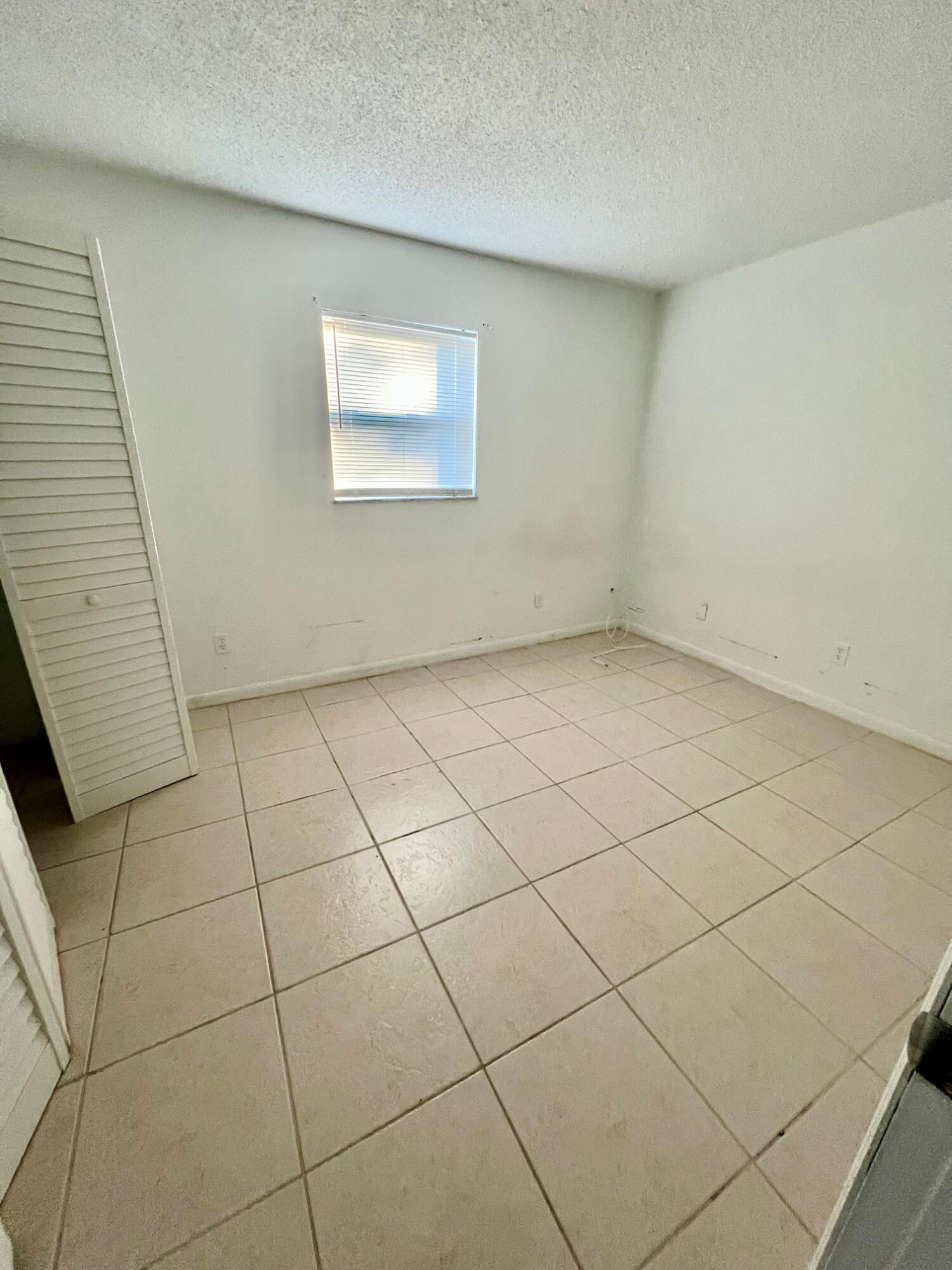 3300 Southeast Fairmont Street Stuart, FL 34997 - Photo 10 of 13 a view of a garage