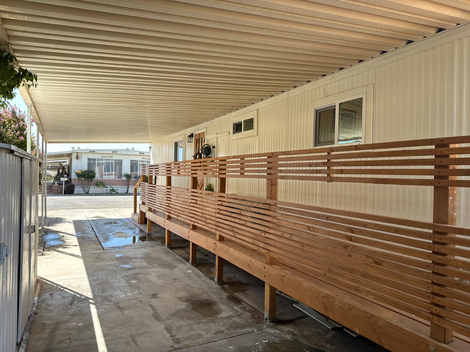 225 North Akers Road, Unit 308 Visalia, CA 93291 - Photo 70 of 72 a large white building with a large window