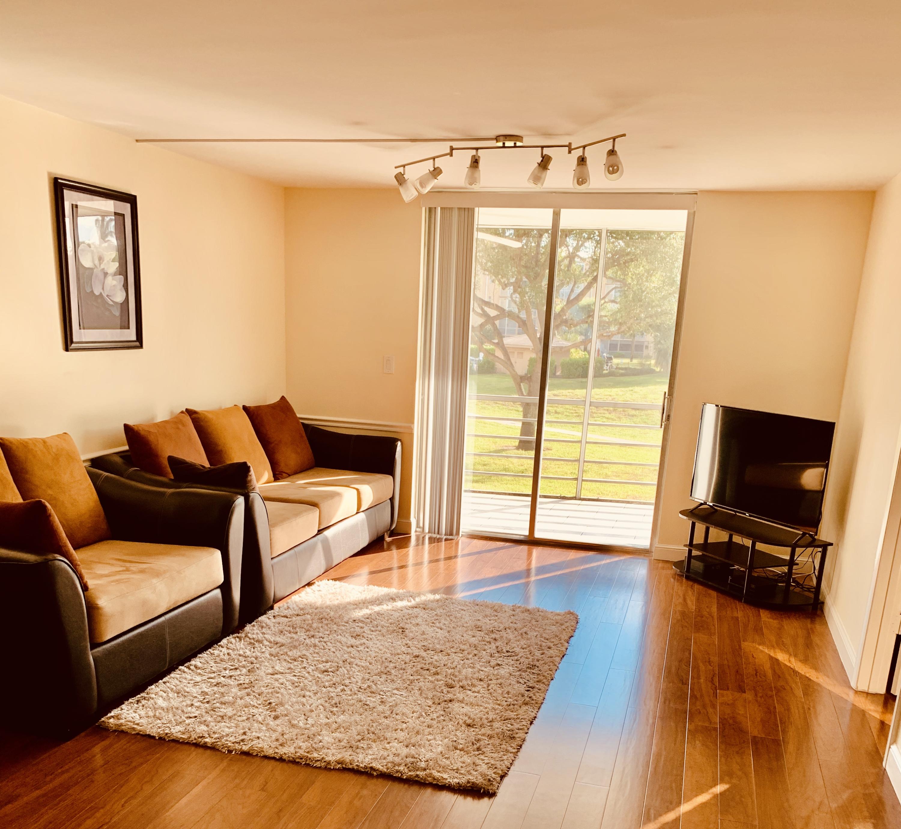 5301 Northwest 2nd Avenue, Unit 207 Boca Raton, FL 33487 - Photo 4 of 17 Living Room