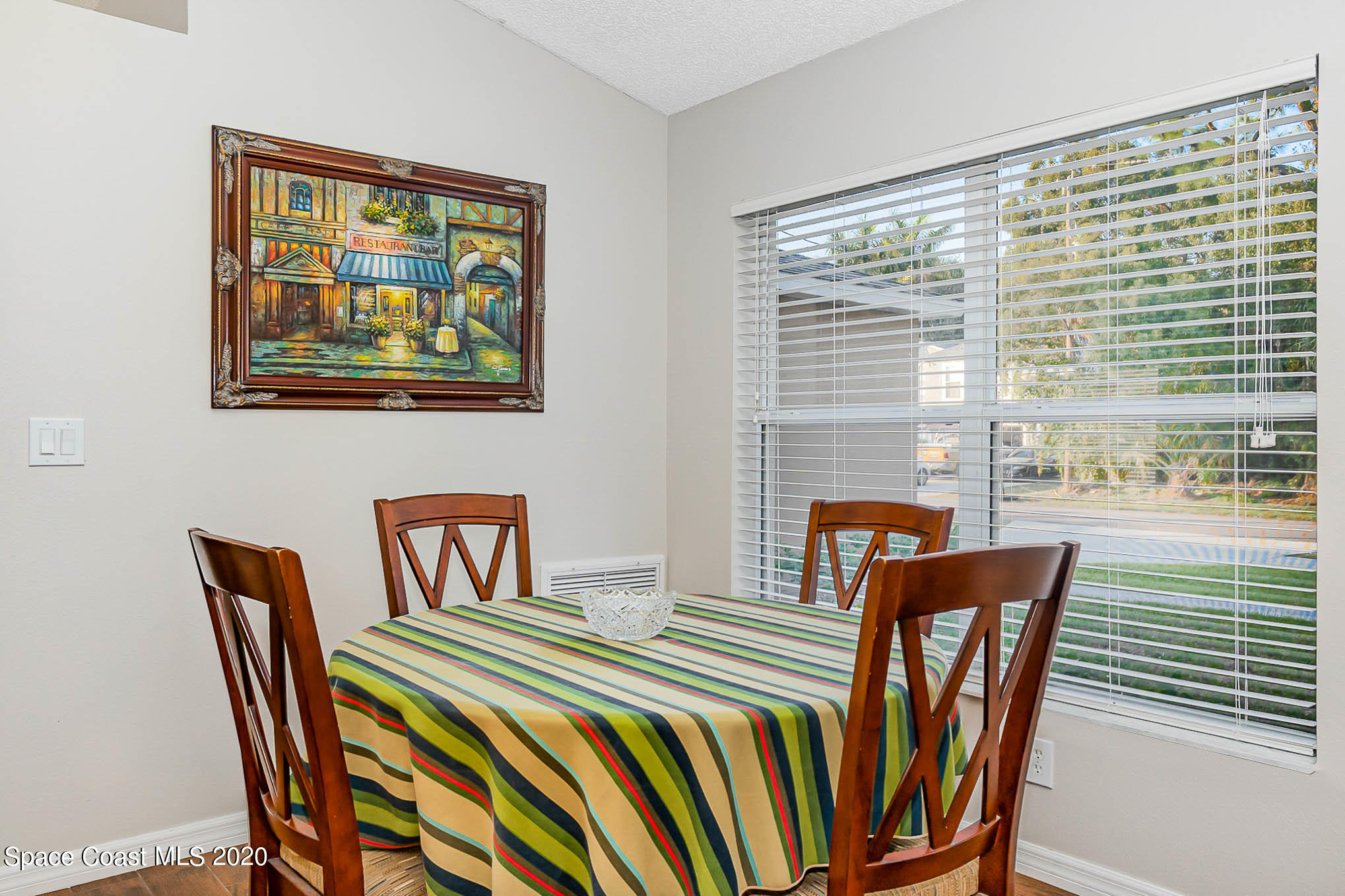5209 Carrick Road Cocoa, FL 32927 - Photo 3 of 23 a view of a dining room with furniture and window