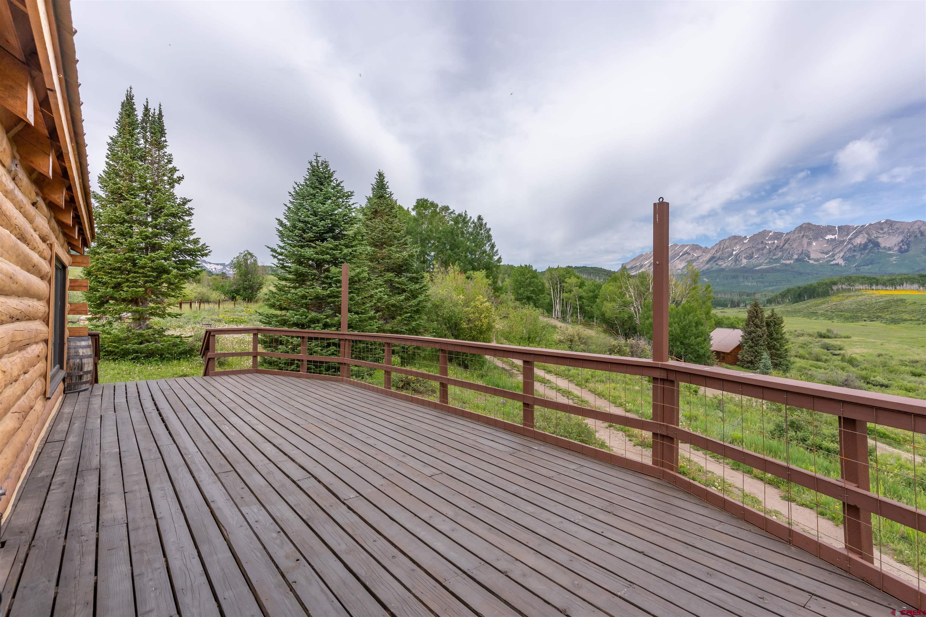 320 Sioux Road Gunnison, CO 81230 - Photo 12 of 35 a view of a balcony with wooden floor