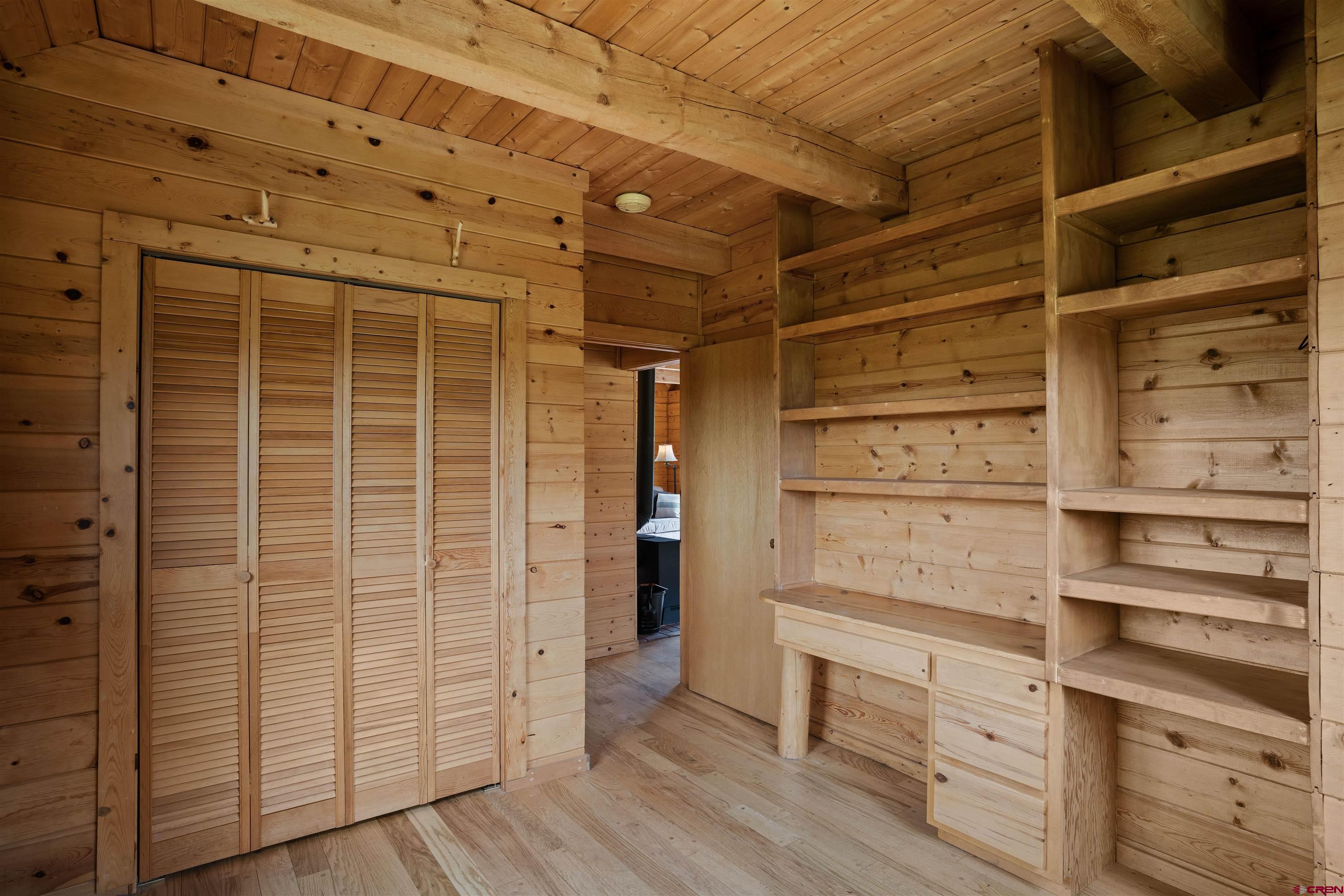 320 Sioux Road Gunnison, CO 81230 - Photo 17 of 35 a view of walk in closet with empty racks