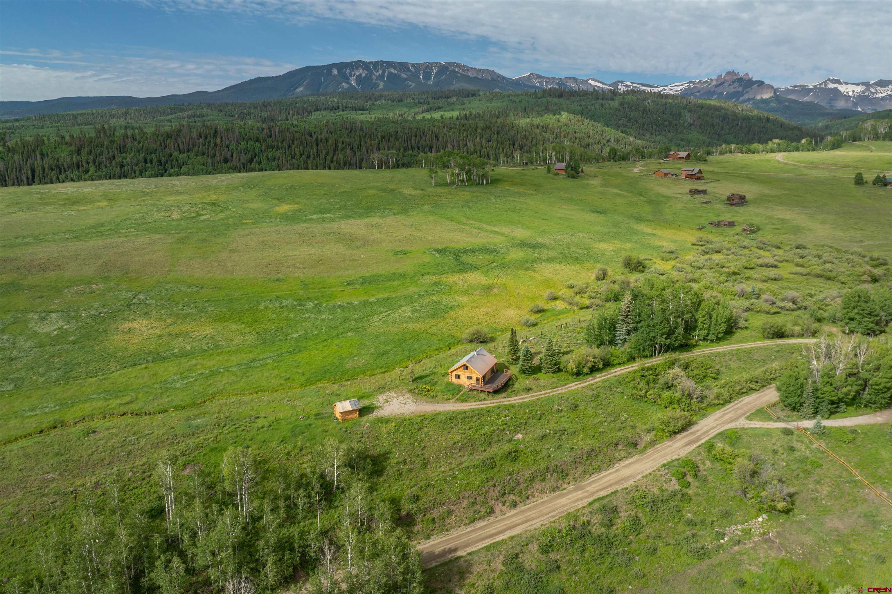 320 Sioux Road Gunnison, CO 81230 - Photo 25 of 35 a view of a lush green hillside and houses