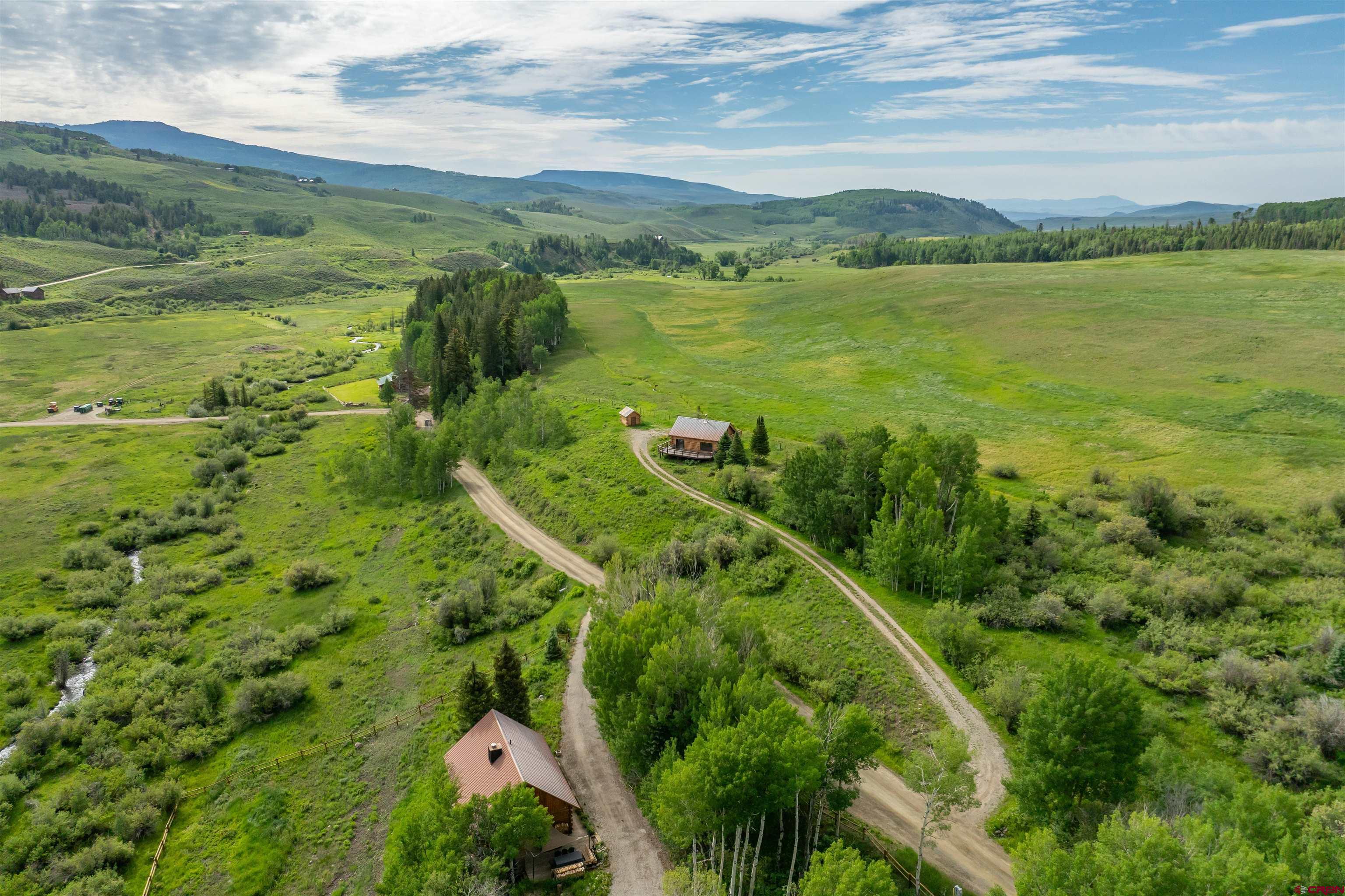 320 Sioux Road Gunnison, CO 81230 - Photo 26 of 35 a view of a garden with an ocean view