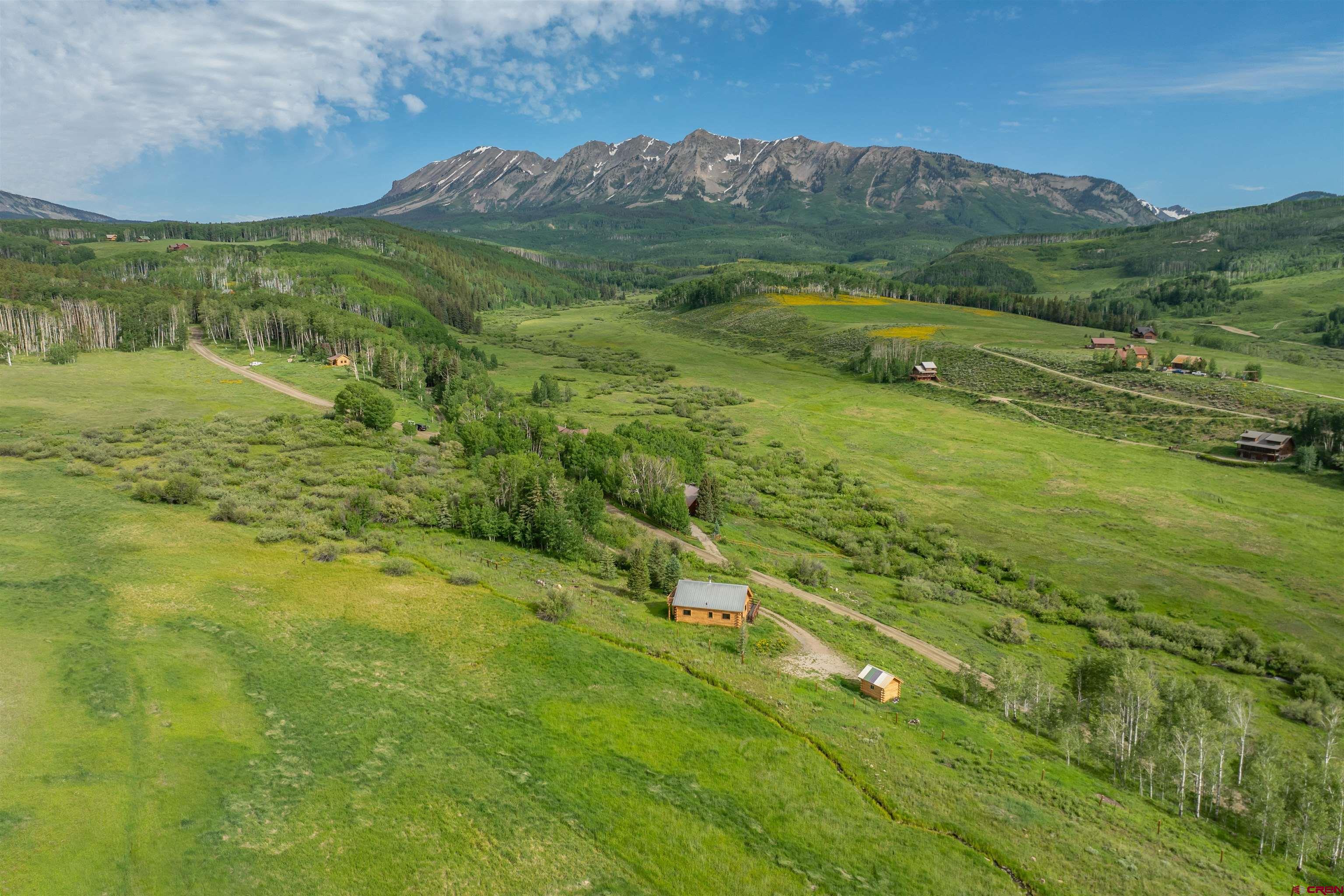 320 Sioux Road Gunnison, CO 81230 - Photo 27 of 35 a view of an aerial view of residential houses with outdoor space and trees