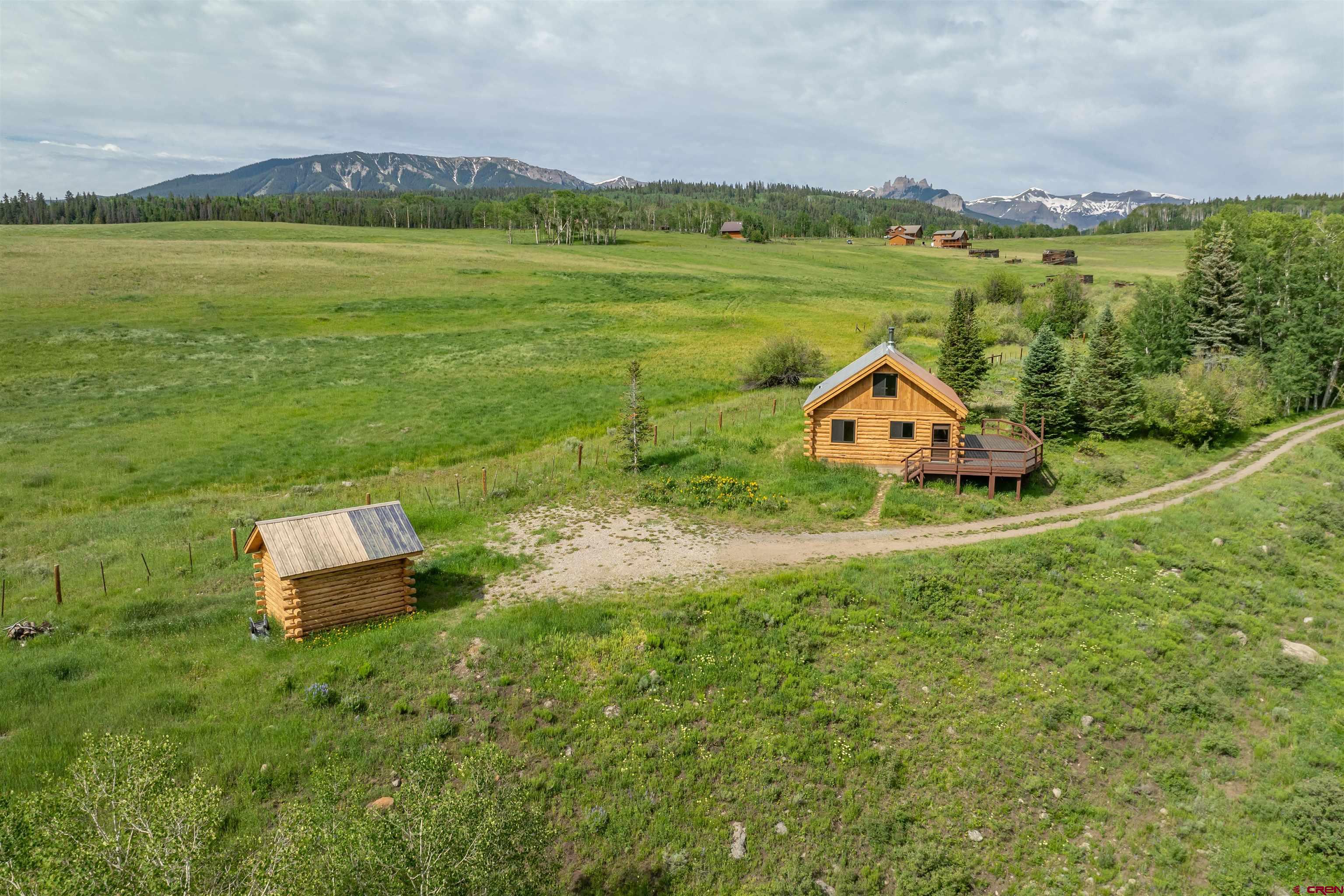 320 Sioux Road Gunnison, CO 81230 - Photo 30 of 35 a view of a garden with a lake