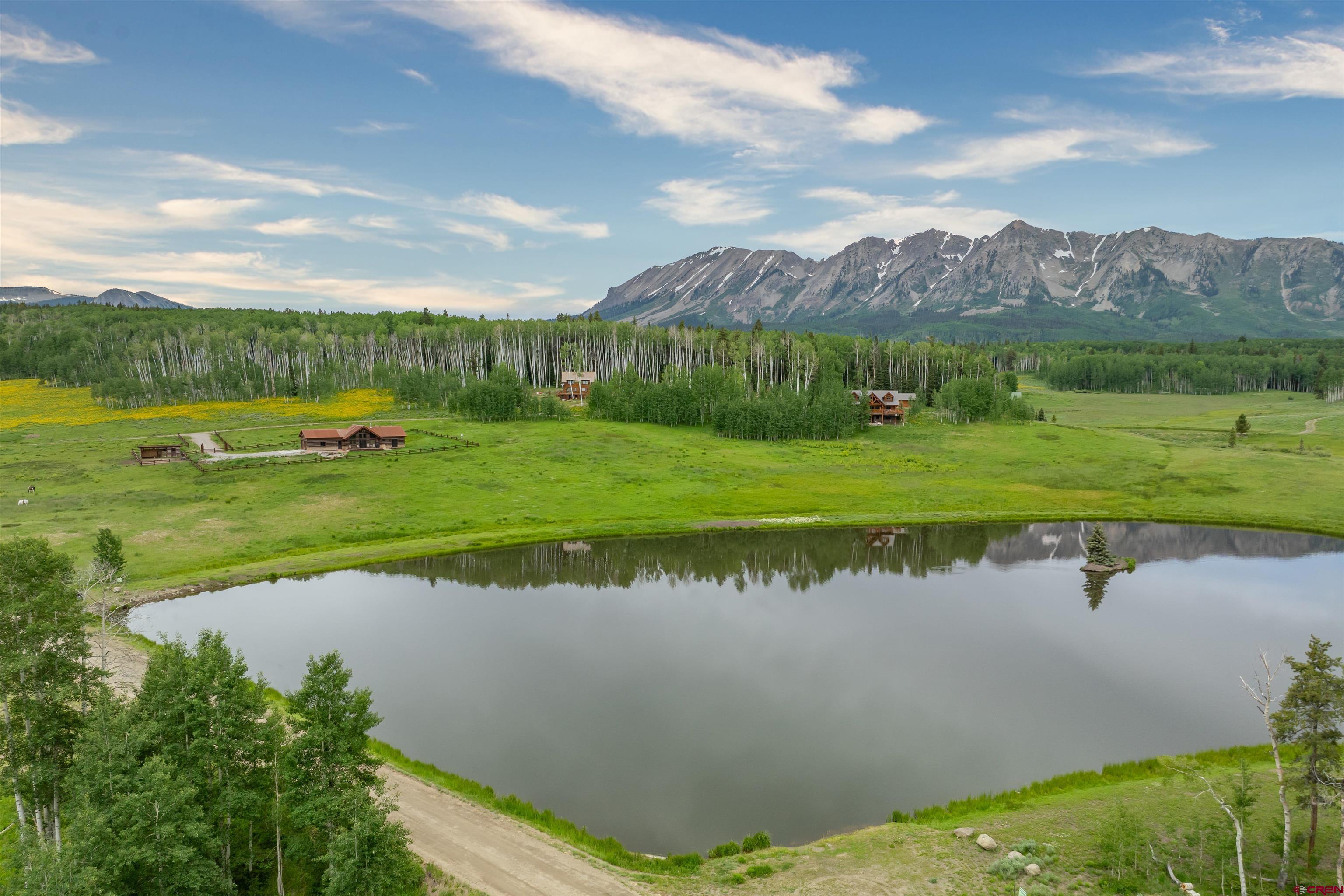 320 Sioux Road Gunnison, CO 81230 - Photo 34 of 35 a view of a lake with a city