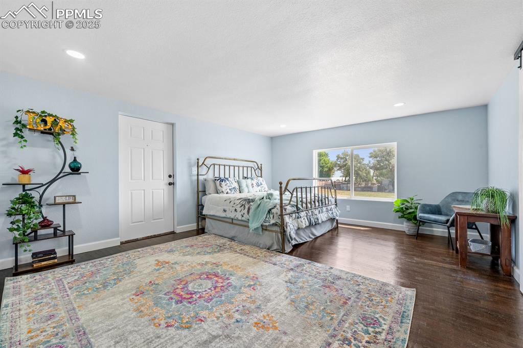 29767 Preston Road Pueblo, CO 81006 - Photo 20 of 46 a bedroom with furniture and a window