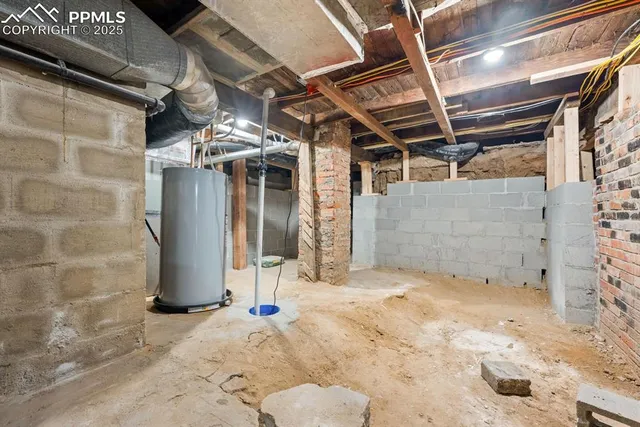 a front view of a house with outdoor seating