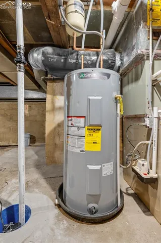a view of a house with snow on the road