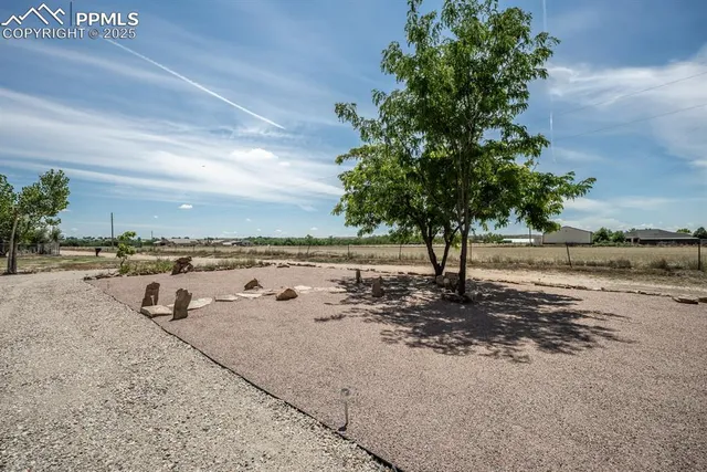 a view of a road with an outdoor space