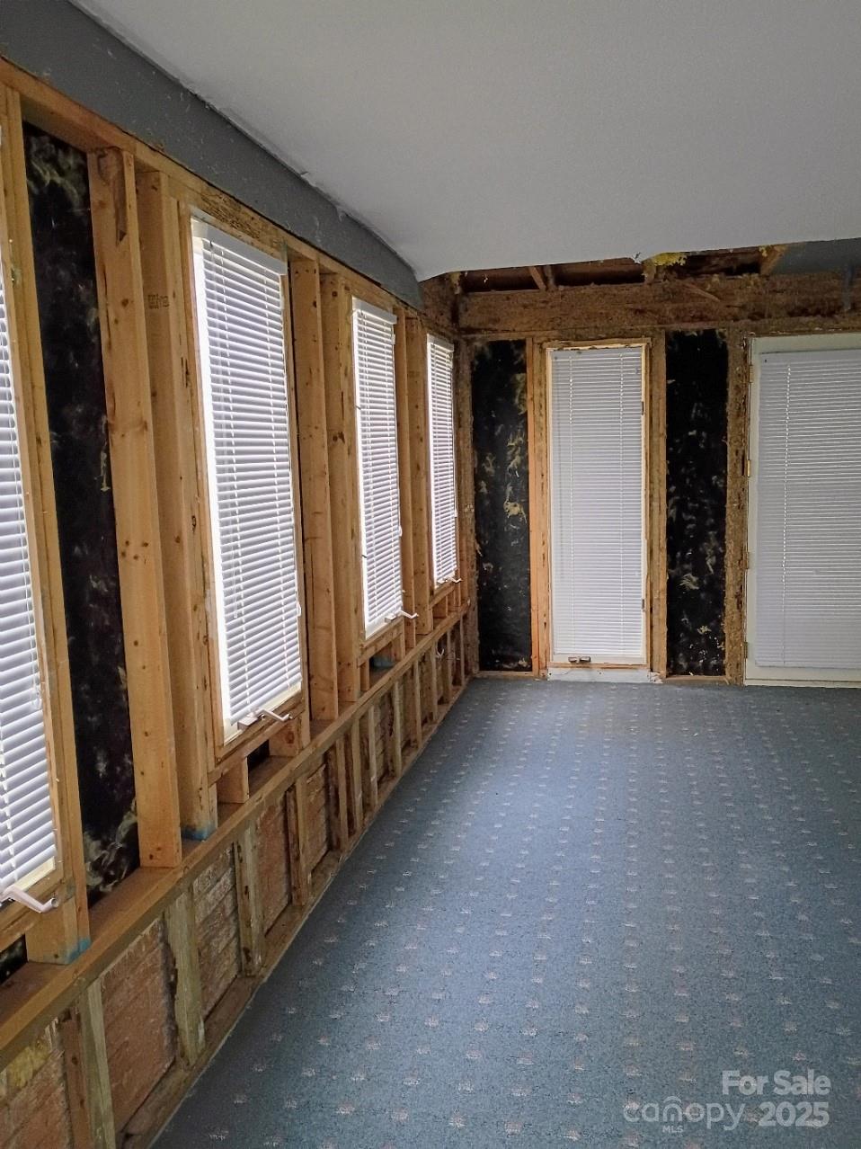 141 Justice Drive Rutherfordton, NC 28139 - Photo 13 of 30 a view of an empty room with windows