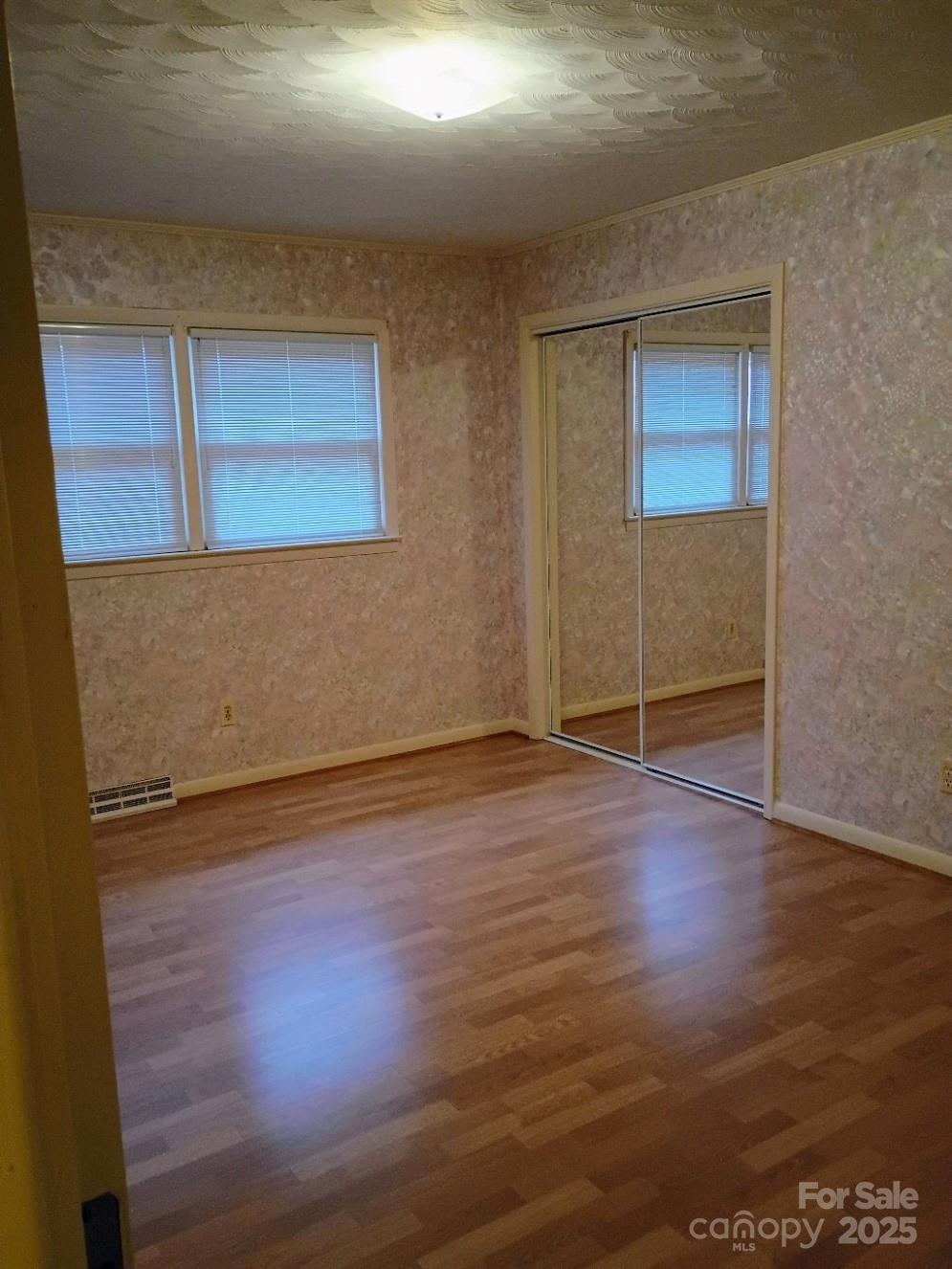 141 Justice Drive Rutherfordton, NC 28139 - Photo 22 of 30 an empty room with wooden floor and windows
