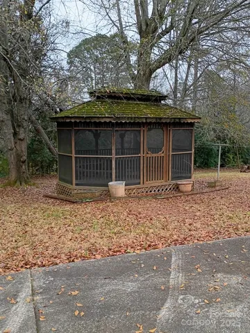 a view of a car park side of the road
