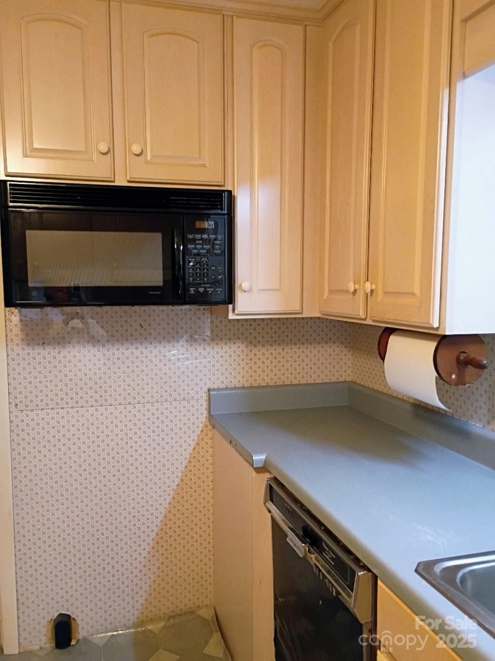141 Justice Drive Rutherfordton, NC 28139 - Photo 9 of 30 a kitchen with a sink and cabinets