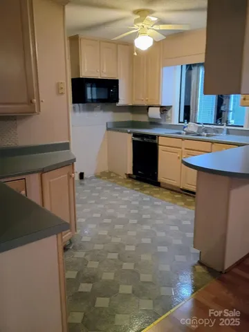 a view of storage and utility room with closet