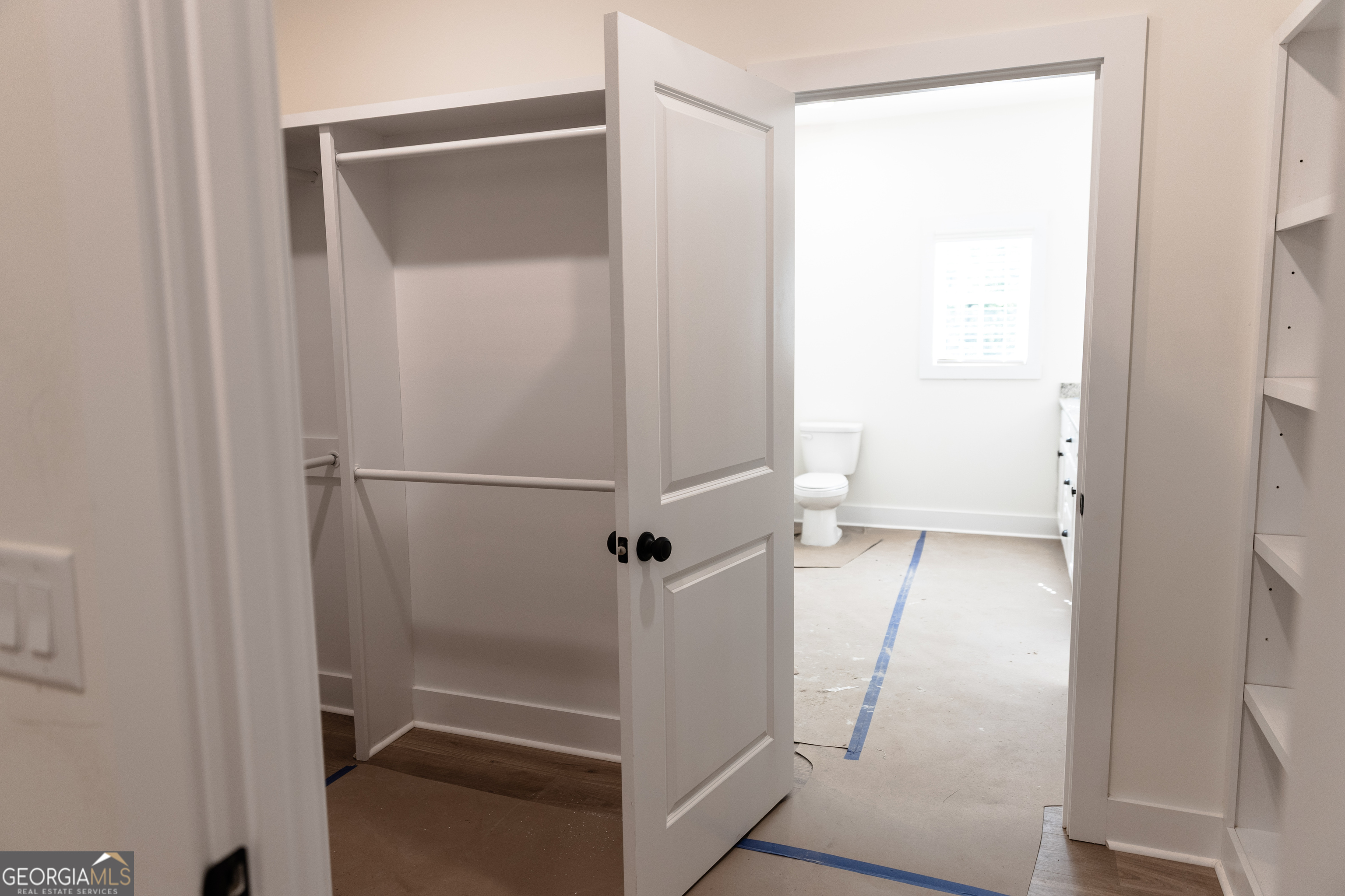 632 Campbell Road Covington, GA 30014 - Photo 26 of 60 a bathroom with a glass shower door