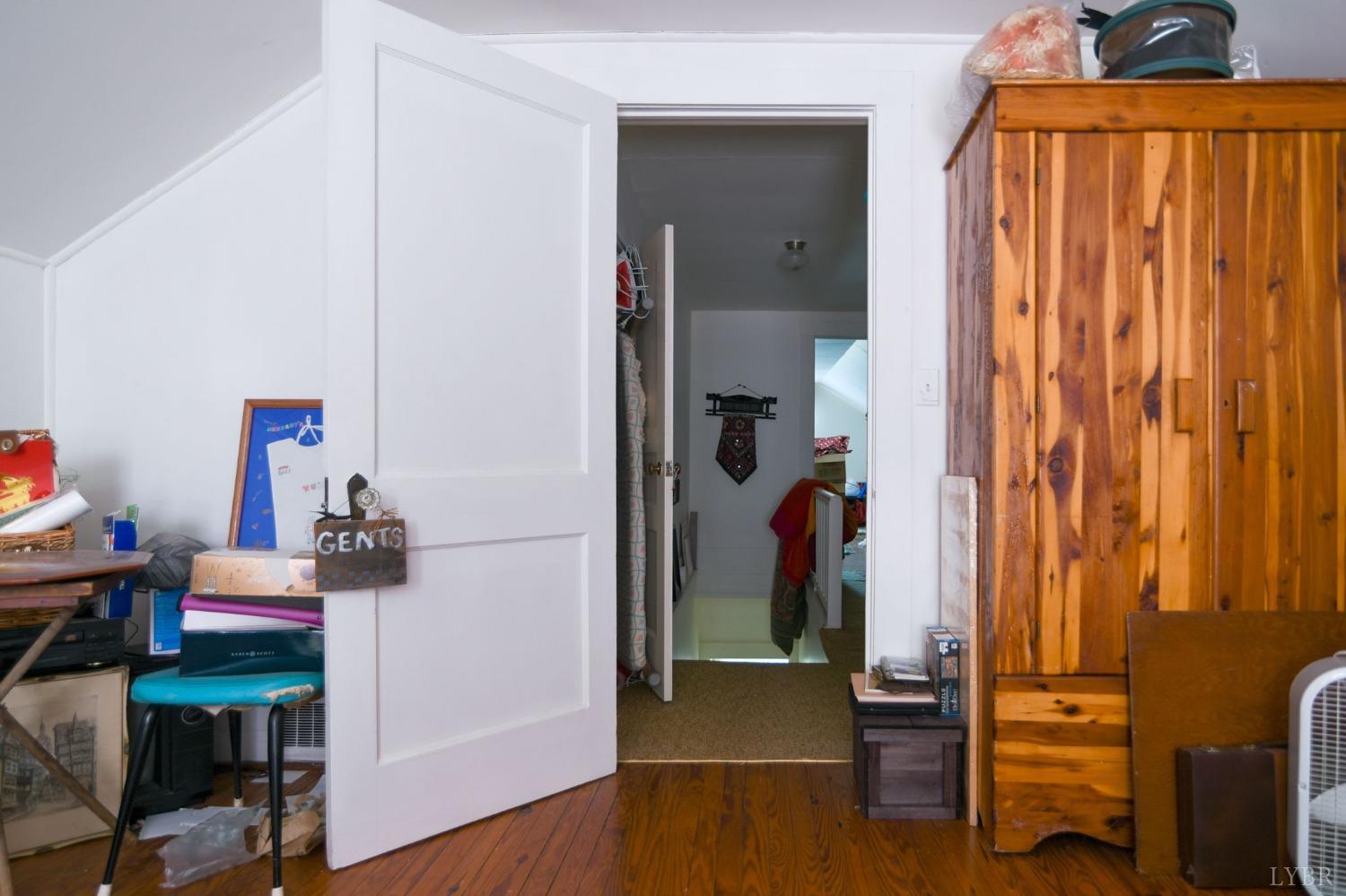 231 Epsons Road Long Island, VA 24569 - Photo 23 of 38 a room with furniture and wooden floor