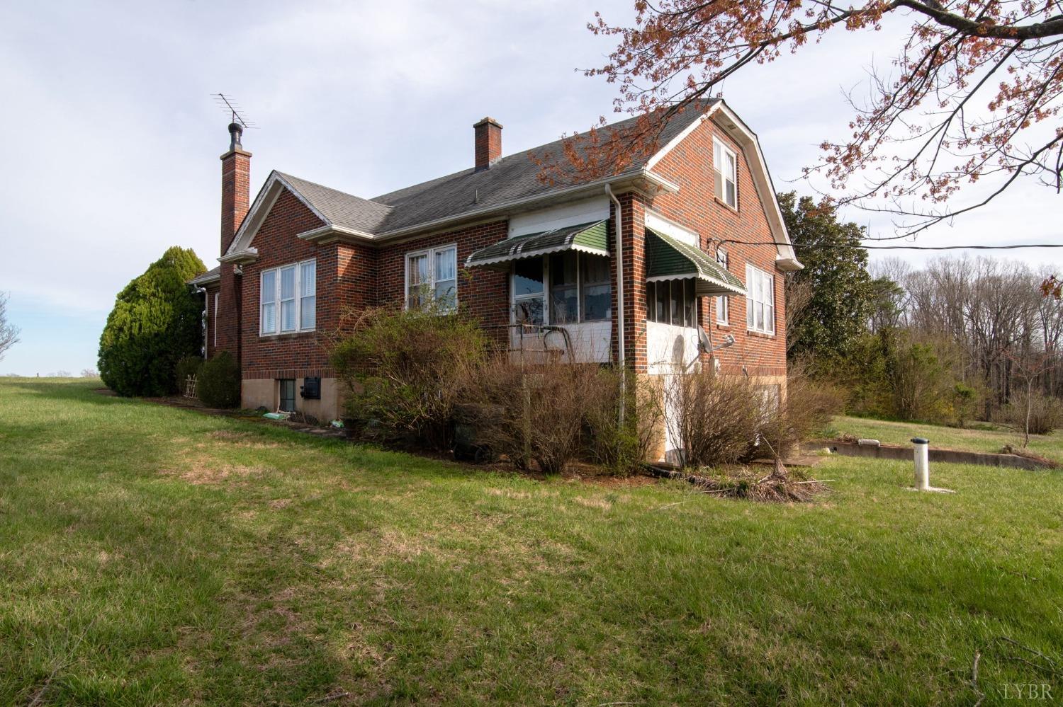 231 Epsons Road Long Island, VA 24569 - Photo 36 of 38 a front view of a house with a yard