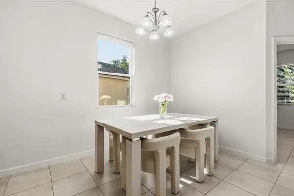a view of a dining room with furniture